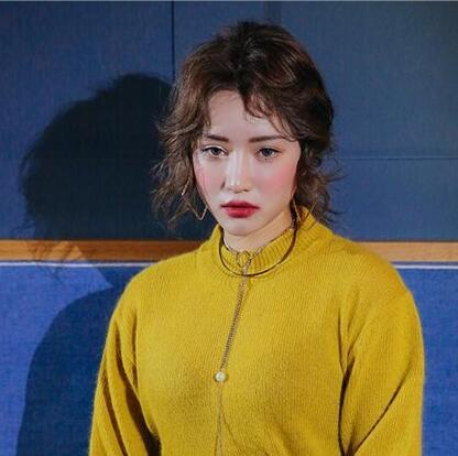 亚麻色头发图片 打蜡显得更有光泽